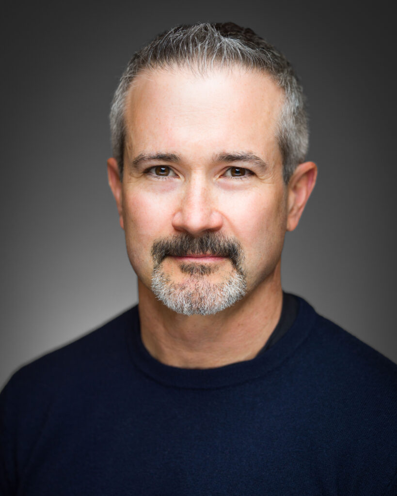 Corporate headshot from a single-visit on-site headshot day in Philadelphia
